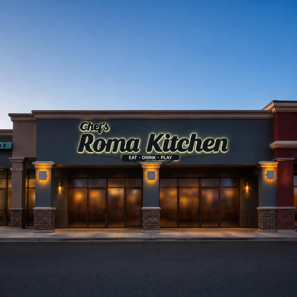 Chef's Roma Kitchen exterior at dusk on Horizon Ridge Parkway in Henderson, with the warm glowing script signage