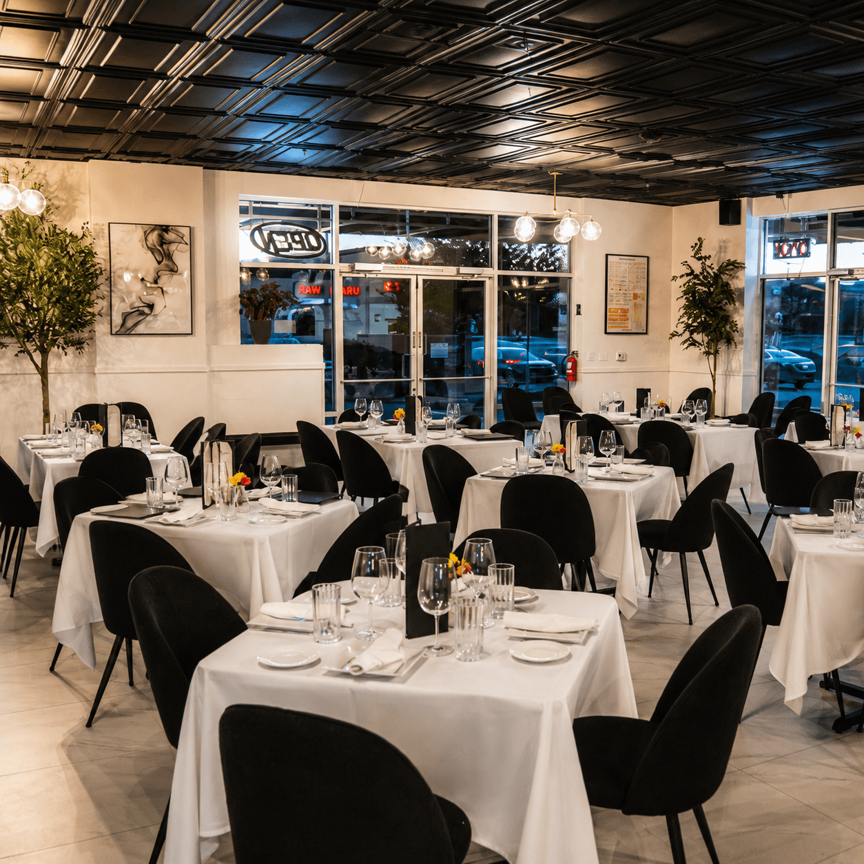 Chef Roma Southern Highlands dining room set with white tablecloths for a private event