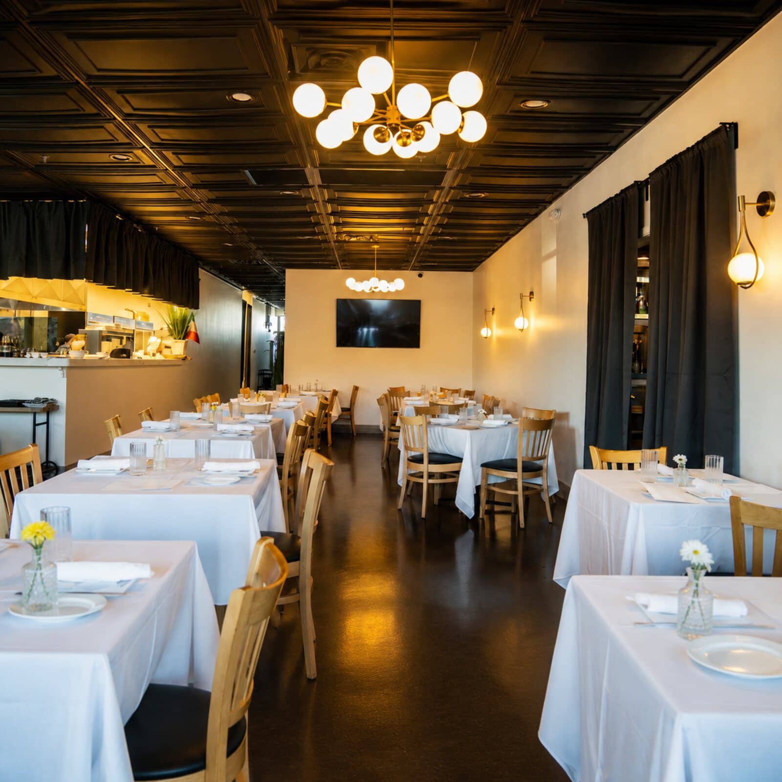 Chef's Roma Kitchen private dining room prepared for guests